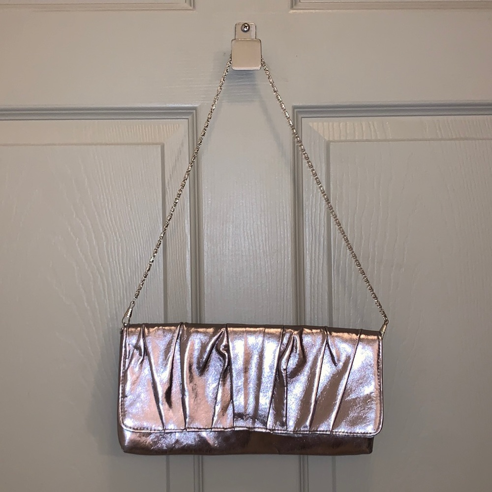 Clutch with removal strap